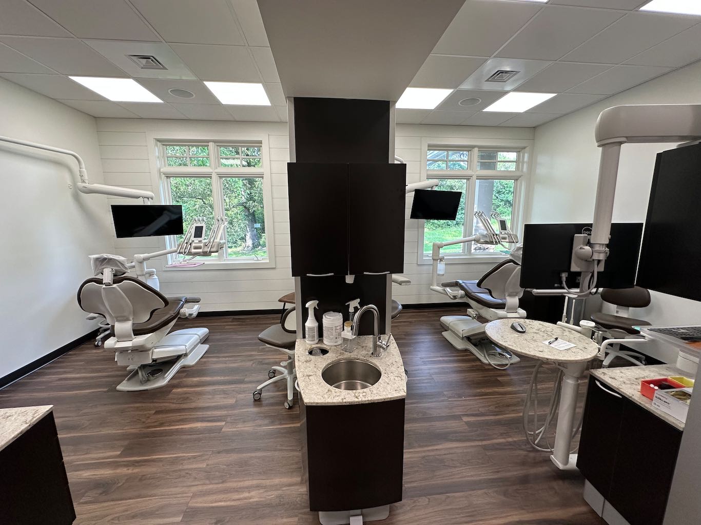 Modern treatment room at Harrison Family Dentistry with advanced dental technology